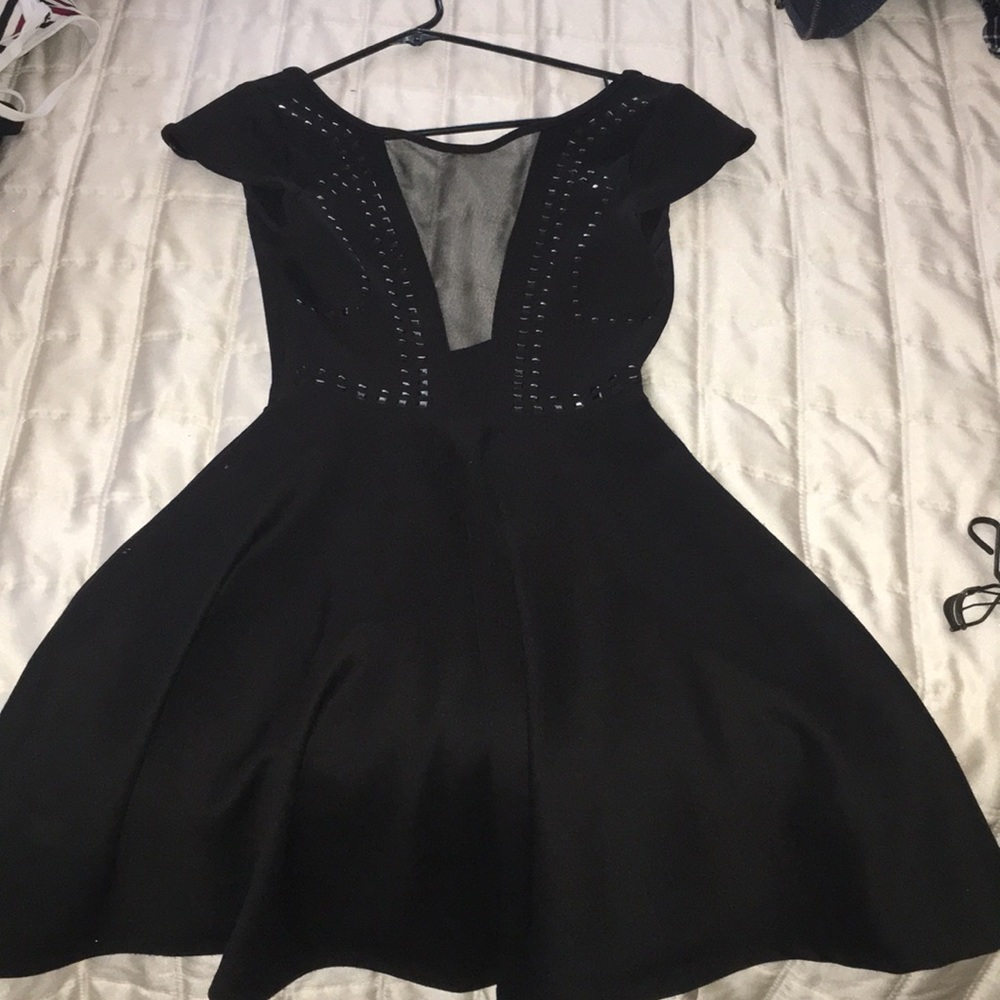 Low black mini dress